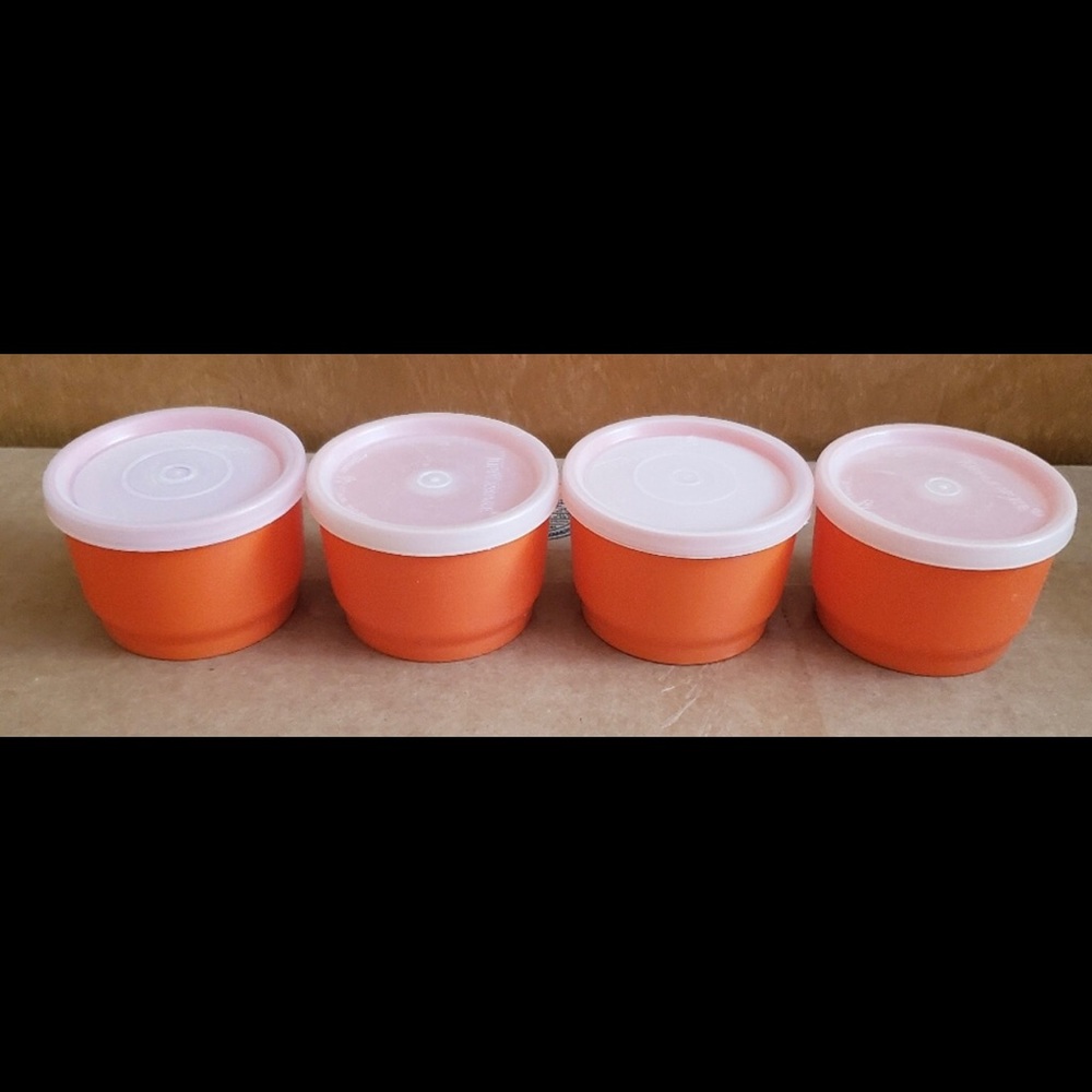 Vintage Tupperware orange snack cups with lids
